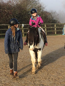 kitty Scarboro, riding her favourite pony jimmy has achieved Accessibility Mark with RDA