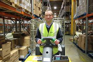 Autism Apprentice - John- packing boxes in warehouse