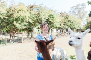 Claire Sweet with alpacas