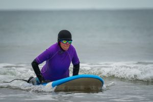 adult attending blue horizons surf school